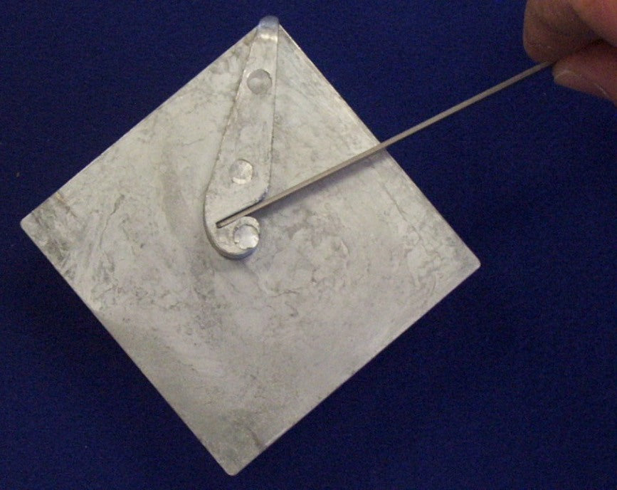 Kosy Creations BJ2 step 1 metal is placed in slot with edge resting on top plate