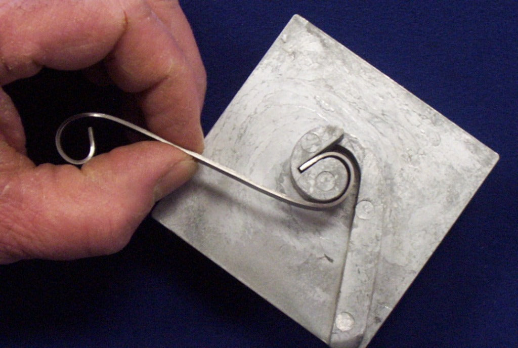 Kosy Creations BJ2 continuing to form metal around scroll bender former