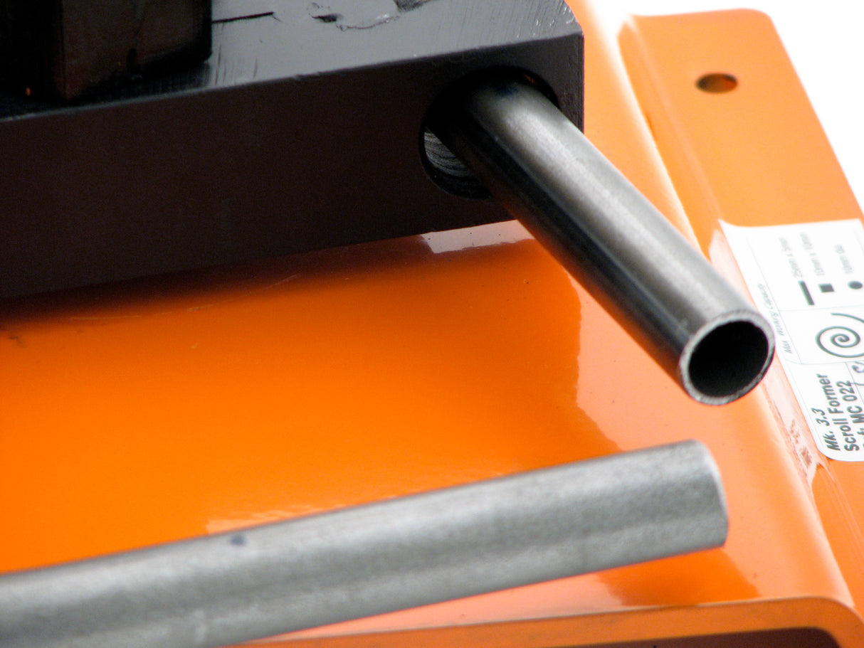 Extreme closeup of 3/4" O.D. tubing on the Metalcraft Scroll Bender MK3/3 Former