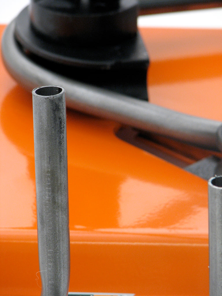 Extreme closeup of 3/4" O.D. tubing bending around tubing components