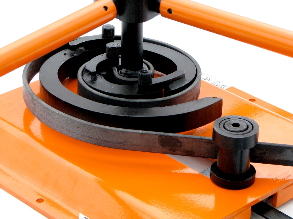 Closeup of scroll segments with scroll completed using hot rolled mild steel strip.