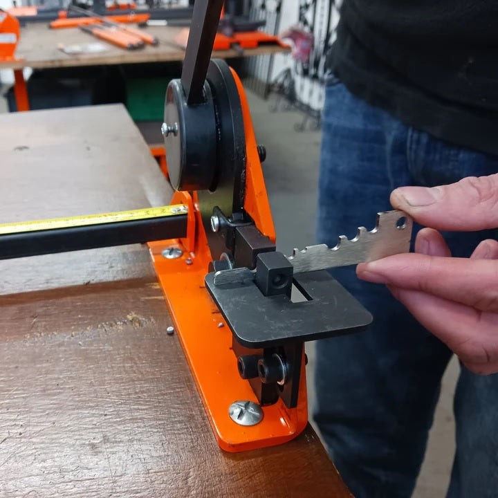 Metalcraft Hole Punch being used to set Punch/Shear at correct height for punching hole in center of flat strip.