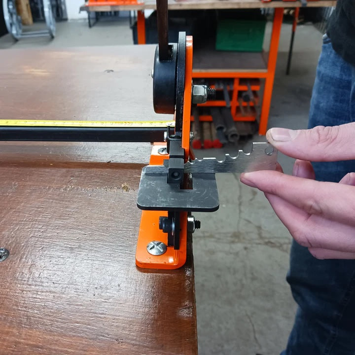Metalcraft Hole Punch being used to set Punch/Shear at correct height for punching hole in center of flat strip. Picture 2