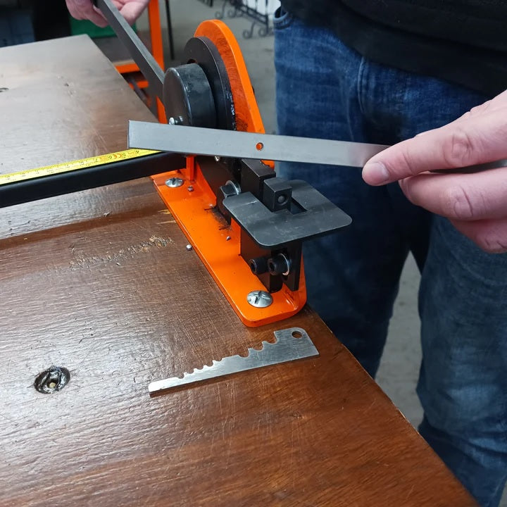 Hole shown as punched in center of flat strip metal