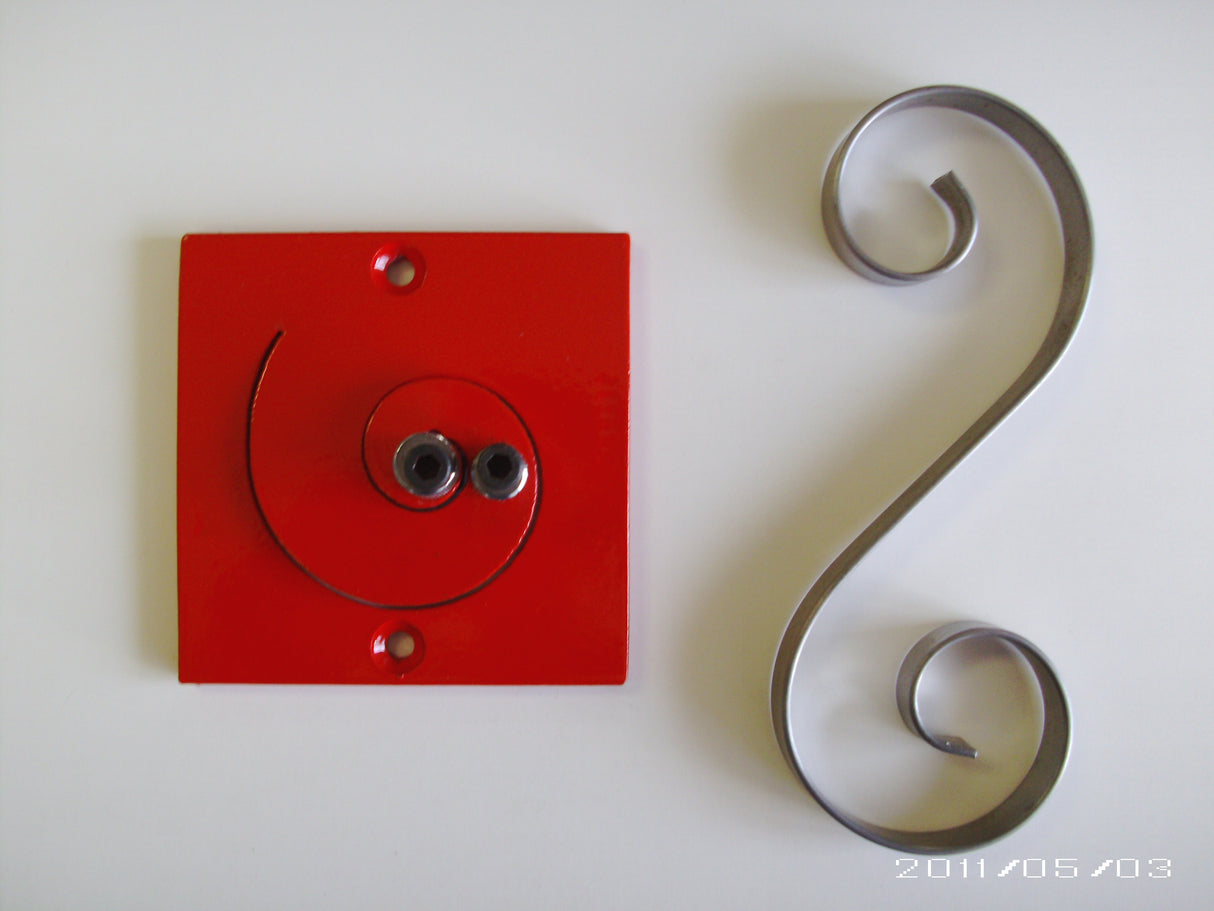 Completed scroll next to Metalcraft MK1 Red Scroll Bender