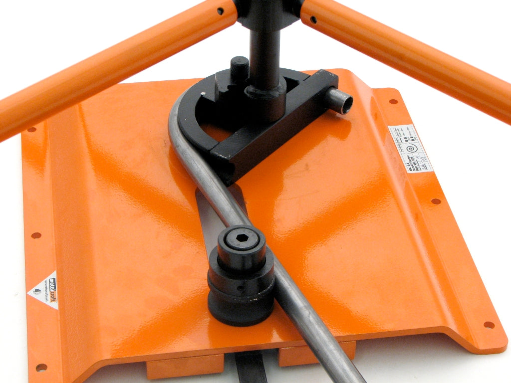 3/4" O.D. round tubing being bent on the Metalcraft Scroll Bender MK3/4 Former using tube components. Up to a 180 degree bend can be achieved in tubing.