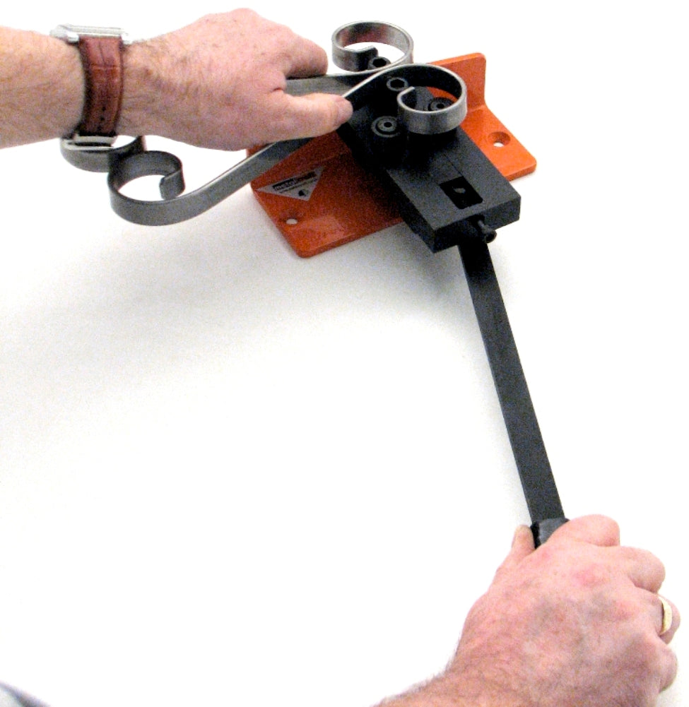 Riveting two pieces of hot rolled mild steel strip together using the Metalcraft Practical Riveting Bending Rolling Tool