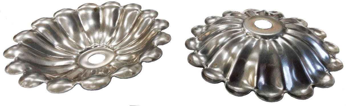 Metal Stamping Pressed Stamped Steel Candle Tray Plate Holder Embossed .020" Thickness T34 Overall approx. 3 3/4" diameter across the top x 5/8" high This domed candle tray has a 1" dia. slightly sunken bottom, then sides go up 1/16" and then flare out