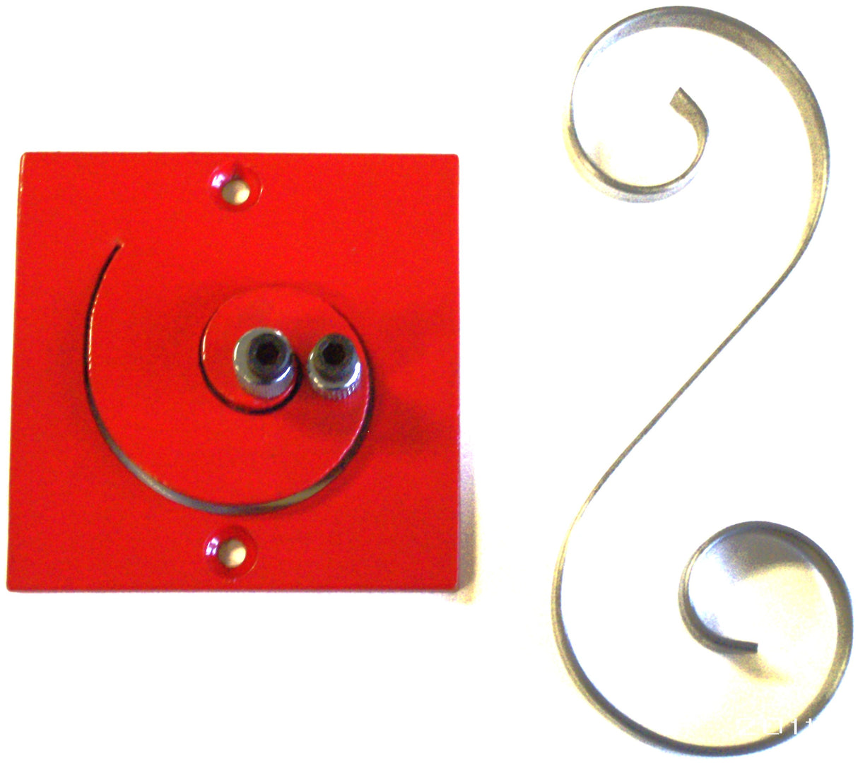 Completed scroll next to Metalcraft MK1 Red Scroll Bender