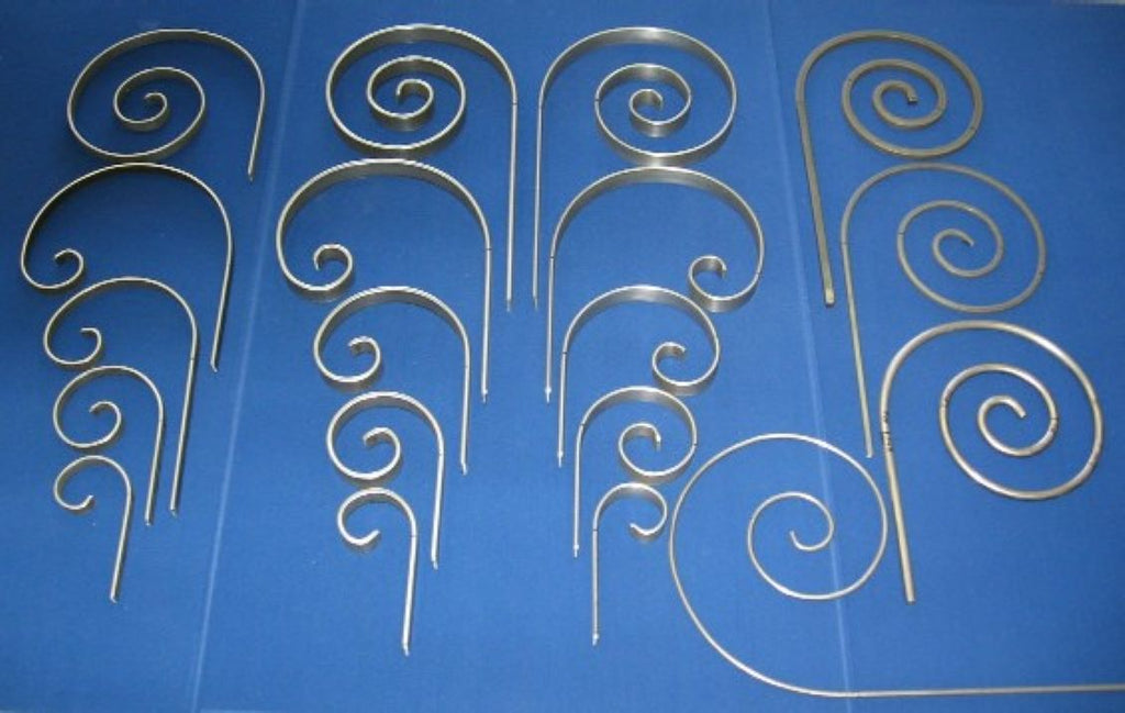 Pictured are some of the scrolls that can be made using the Metalcraft Scroll Bender MK3/3 Former. By combining different segments together one can achieve different scroll designs such as pictured here.