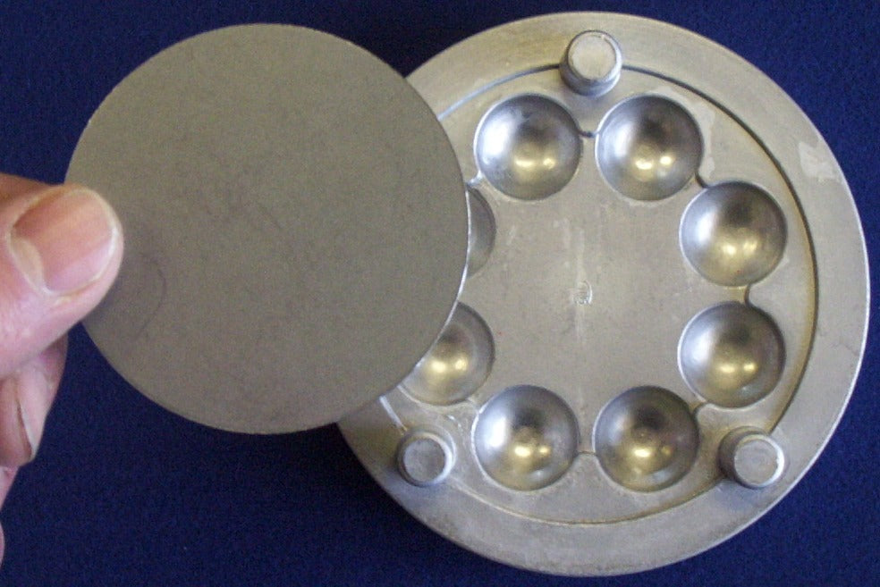 Step 1 in fluting a tray. Take a blank flat plain disc (our DP2 or DP2withHole) and place on female part of FD1 set