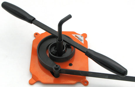 Metalcraft MK2/3 Scroll Bender.  Shown with piece of flat metal steel strip formed in a scroll.  Does same size metal as the MK2/2H Scroll Bender BUT metal is drawn in as you turn the handle vs. on the MK2/2H the metal is hand drawn around.