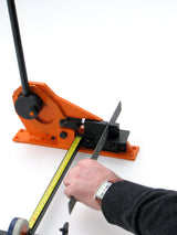 Holes being punched on Master Punch/Shear tool