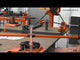 Video showing how to make a scroll using the Metalcraft Scroll Bender MK3/4 Former using 2"w x  1/4" thickness flat metal steel strip.  In background one can see the Metalcraft Tool Bench with variety of tools on top and the XL5+ Power Bender mounted on Option 1 Pedestal.