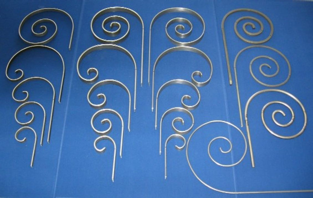 Pictured are some of the scrolls that can be made using the Metalcraft Scroll Bender MK3/3 Former.  By combining different segments together one can achieve different scroll designs such as pictured here.